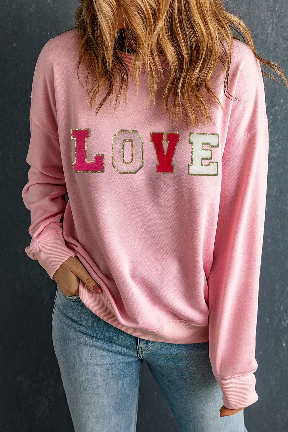 Love Never Fails Glitter Patch Sweatshirt